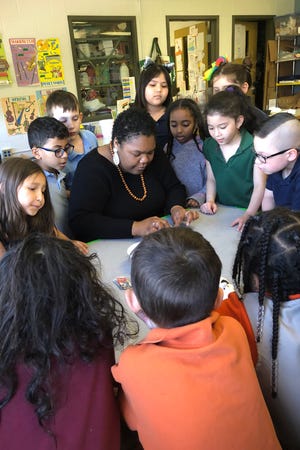 Children's Fine Art Class alumnus LaNia Roberts has come full circle and now teaches for Louisville Visual Art. She led a class at Cochrane Elementary School in April.
