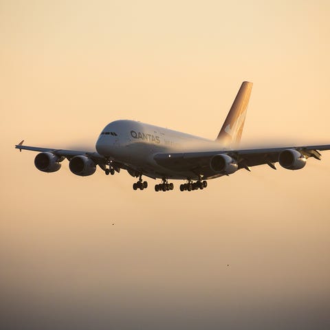 A Qantas Airbus A380 arrives in the early morning 