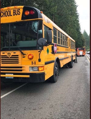 A North Mason School bus was struck by a ladder that fell off a pickup truck Wednesday, Sept. 18, 2019, on Highway 3 in Belfair. No students were on board. The driver had minor injuries.