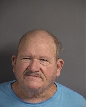 Joe Mike Martin, 73, was arrested after police say he threatened to shoot a group of kids if they "didn't stay off of 'his street,'" on Sept. 13, 2019, in Iowa City.