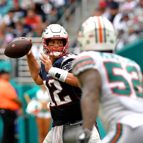 New England Patriots quarterback Tom Brady throws 