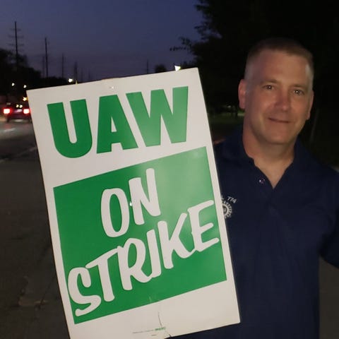 Patrick Anderson on the picket line in Warren, Mic