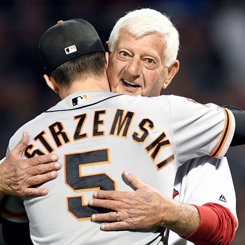Boston Red Sox Hall of Famer Carl Yastrzemski hugs