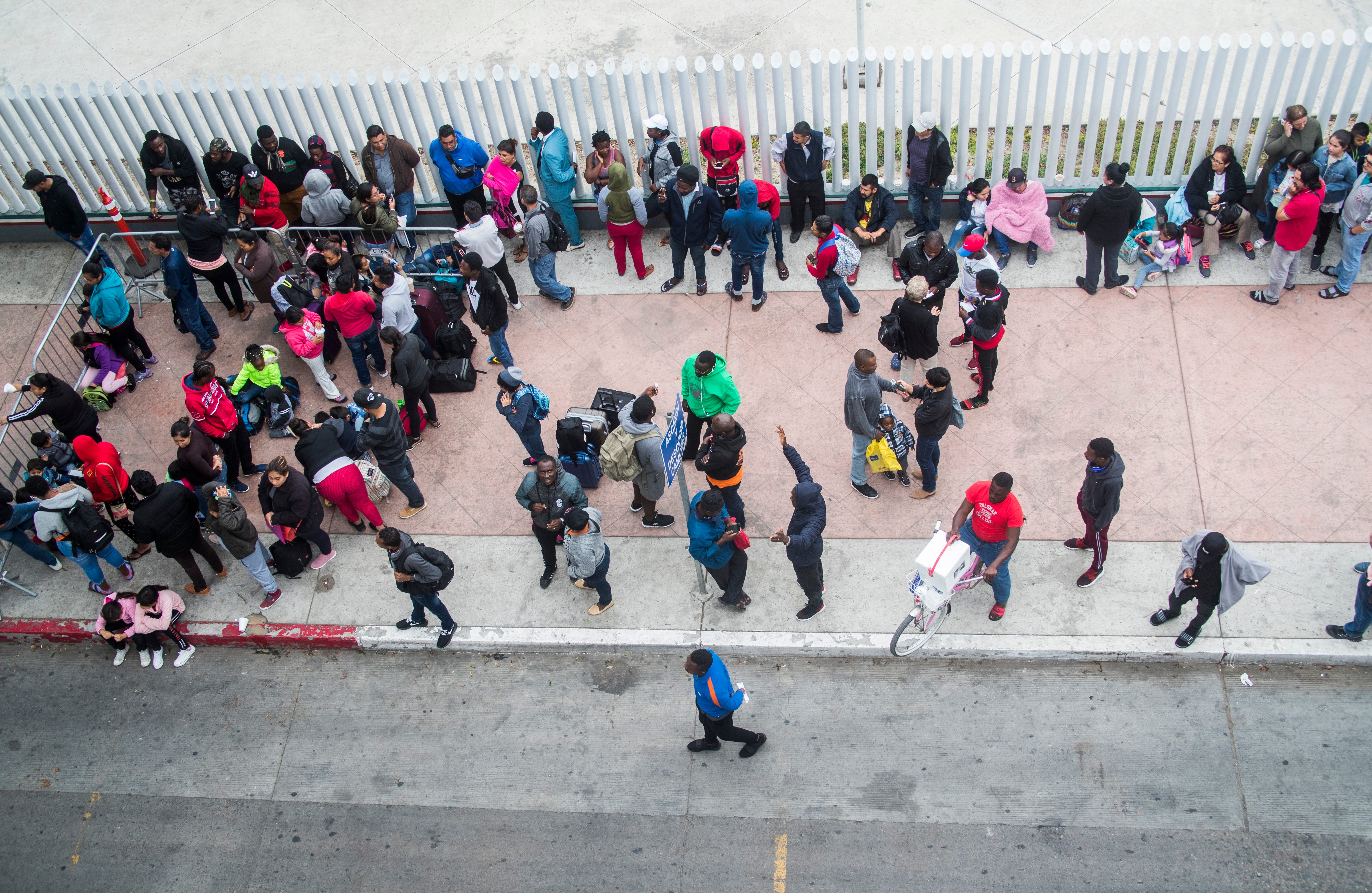 TIJUANA, Mexico – Hundreds of migrants make the daily ritual of visiting the El Chaparral port of entry in Tijuana, Mexico, to see which names will be called from a waiting list to petition for asylum in the United States. The migrants often wait weeks before their number is called.