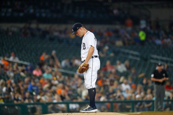 Tigers pitcher Jordan Zimmermann (27) stands on the mound after giving up a two-run home run to Chicago White Sox's Yoan Moncada in the third inning.