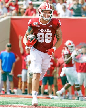 Indiana Hoosiers tight end Peyton Hendershot (86) scores a touchdown during the game against UConn at Memorial Stadium in Bloomington, Ind., on Saturday, Sept. 21, 2019.