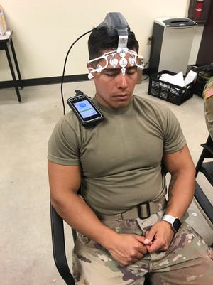 Staff Sgt. Pedro Soto gets scanned for brain activity markers before training in the Urban Mobility Breacher Course. Photo courtesy of Phelps Health.