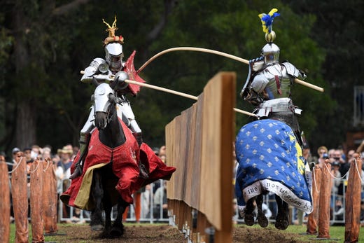 Jousters Dominic Sewell, left, and Anthony Hodges compete in the Jousting Tournament during the traditional St Ives Medieval Faire at the St Ives Show ground in Sydney on Sept. 21, 2019. 