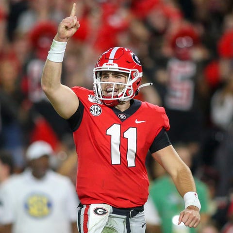 Georgia quarterback Jake Fromm celebrates a first-
