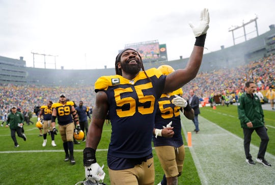 Green Bay Packers outside linebacker Za'Darius Smith (55) celebrates a 27-16 victory against the Denver Broncos Sunday, September 22, 2019, at Lambeau Field in Green Bay, Wis.