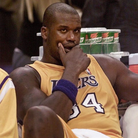 Former Los Angeles Lakers' Shaquille O'Neal sits o