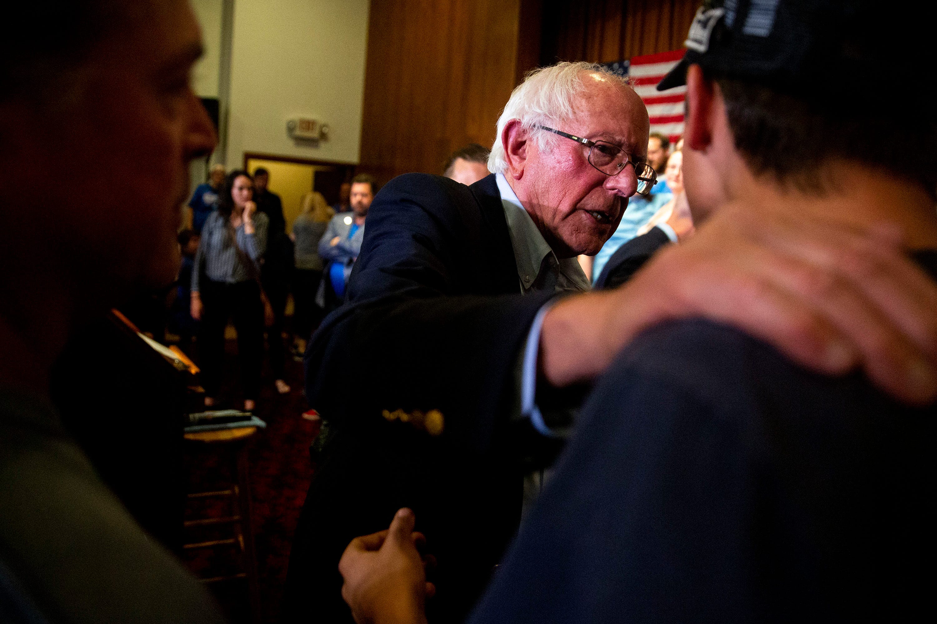 U.S. Sen. Bernie Sanders, D-Vt., talks with people in the crowd after a town hall event on Monday, Sep. 23, 2019, at the Clinton Masonic Center in Clinton.