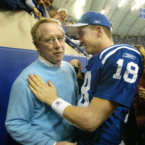 Peyton Manning gets a hug from his father Archie M
