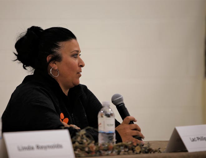 School board candidate Laci Phillips answers a question, Monday, Sept. 23, 2019, during a public forum in Aztec.