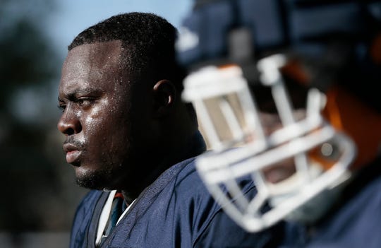 UTEP sophomore defensive tackle Dedrick Simpson takes a breather between reps Tuesday at Glory Road Field. 