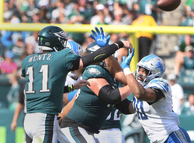 The Lions' Trey Flowers pressures Eagles quarterback Carson Wentz on an incompletion in the third quarter Sunday in Philadelphia.