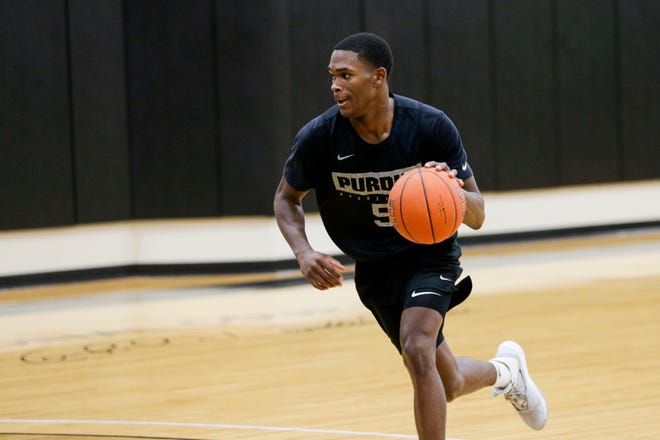 Purdue guard Brandon Newman (5) dribbles during a basketball practice, Wednesday, Sept. 25, 2019, at Mackey Arena's Cardinal Court in West Lafayette.