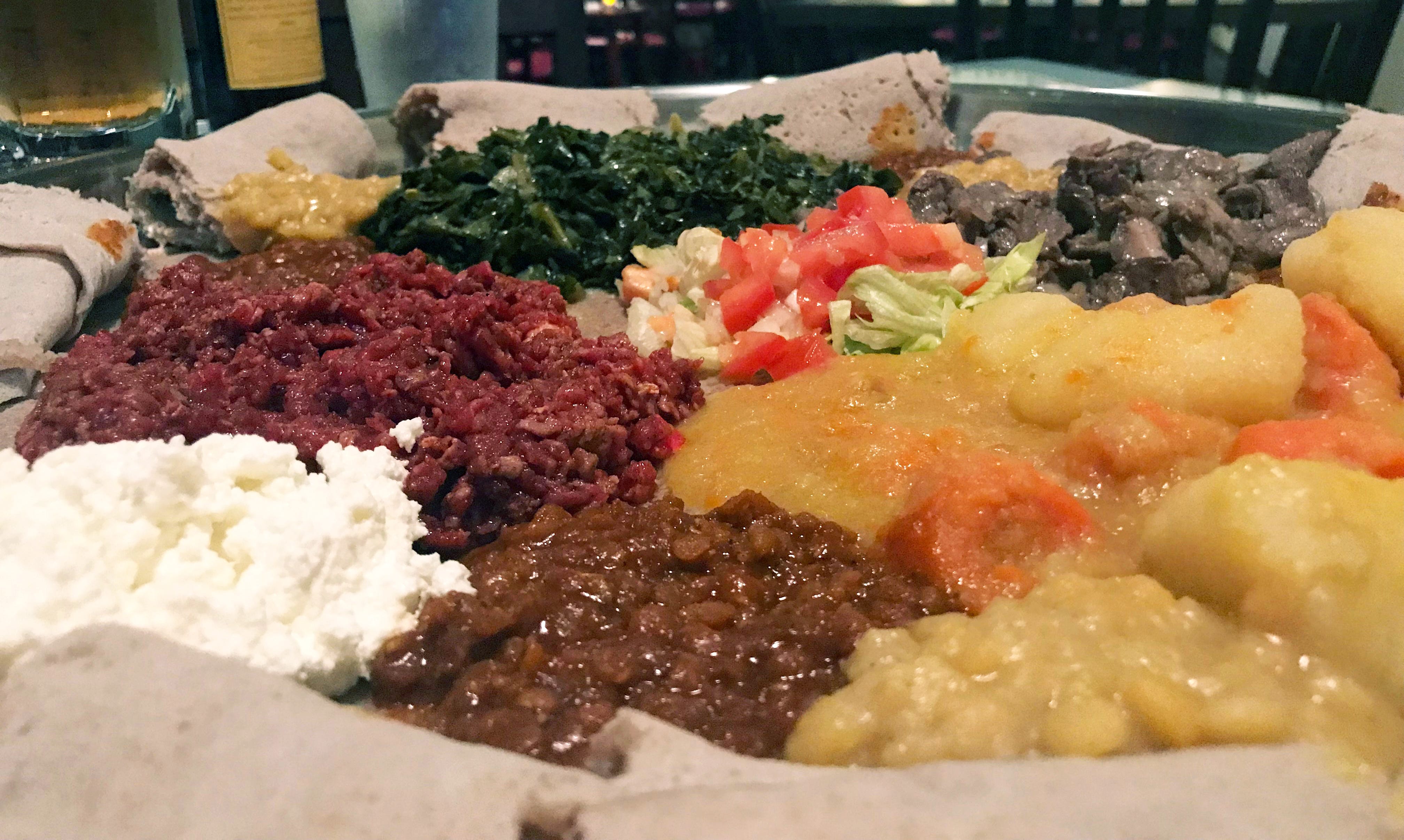 Stews and sautés are served on injera, a sourdough flatbread, at Ethiopian Cottage, 1824 N. Farwell Ave. The menu has many meat and meatless options.