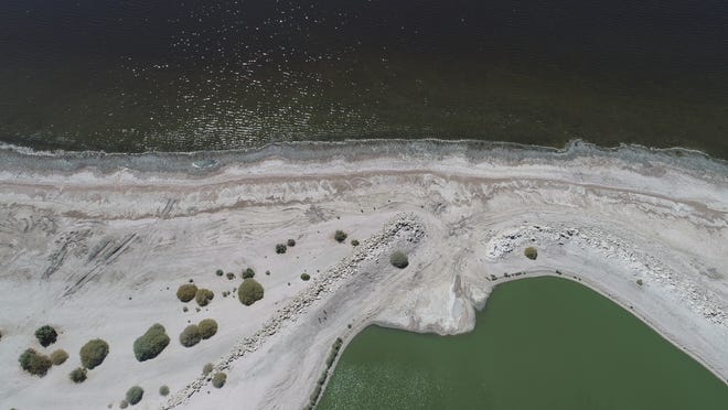 The Salton Sea, California’s largest lake, suffers from a shrinking shoreline that spews toxic dust into the surrounding region. Some treasure hunters believe a ship is buried beneath its waters.