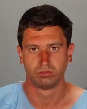 A mugshot of Richard Smallets, 32, who was arrested in Glendale, California in connection with an arson case.