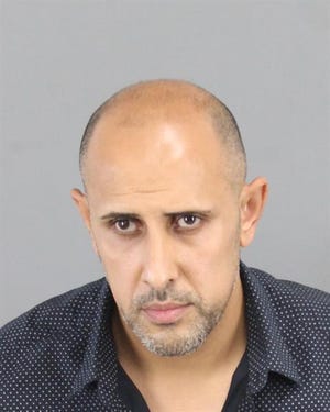 Ibrahim Aljahim, 37, is charged with two counts of criminal sexual conduct involving 18-year-old male student at a school in Hamtramck.