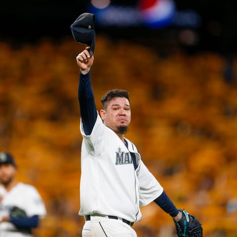 Felix Hernandez tips his cap to the fans after bei