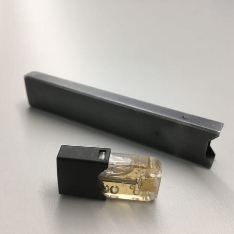 This is a Juul electronic cigarette with the e-liq