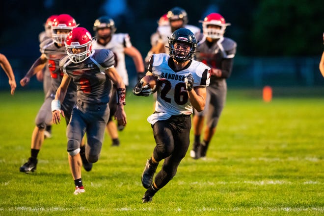 Sandusky running back Delorrin Wedge (26) runs with the football during the second quarter of their game against Marlette Friday, Sept. 27, 2019, at Marlette High School. Wedge's run gave Sandusky their third touchdown of the game.