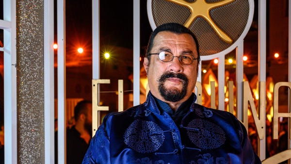 Actor Steven Seagal poses on the the red carpet du