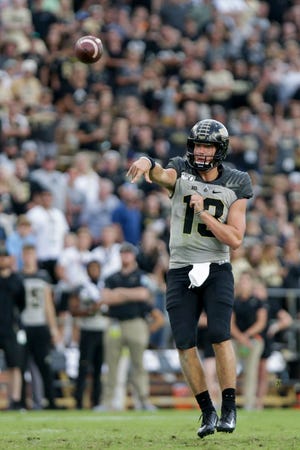 Purdue quarterback Jack Plummer (13) throws during the fourth quarter of an NCAA football game, Saturday, Sept. 28, 2019 at Ross-Ade Stadium in West Lafayette. Minnesota won, 38-31.