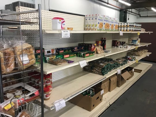 Shelves look empty at the Two Rivers-Mishicot Ecumenical foor pantry