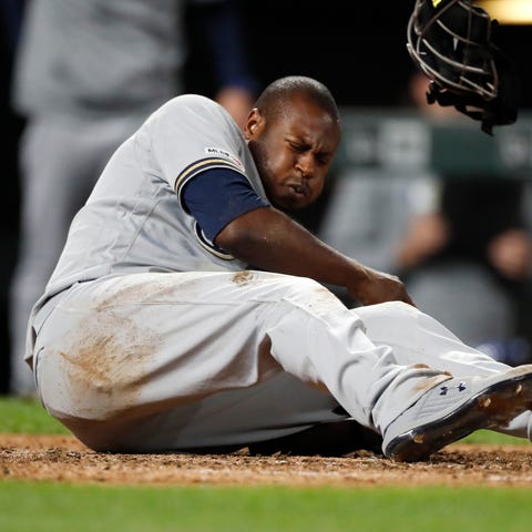 Lorenzo Cain injured his ankle in a collision with