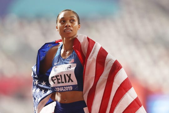 Allyson Felix of the United States reacts after setting a new world record in the 4x400 Metres Mixed Relay during day three of 17th IAAF World Athletics Championships Doha 2019 at Khalifa International Stadium on September 29, 2019 in Doha, Qatar.