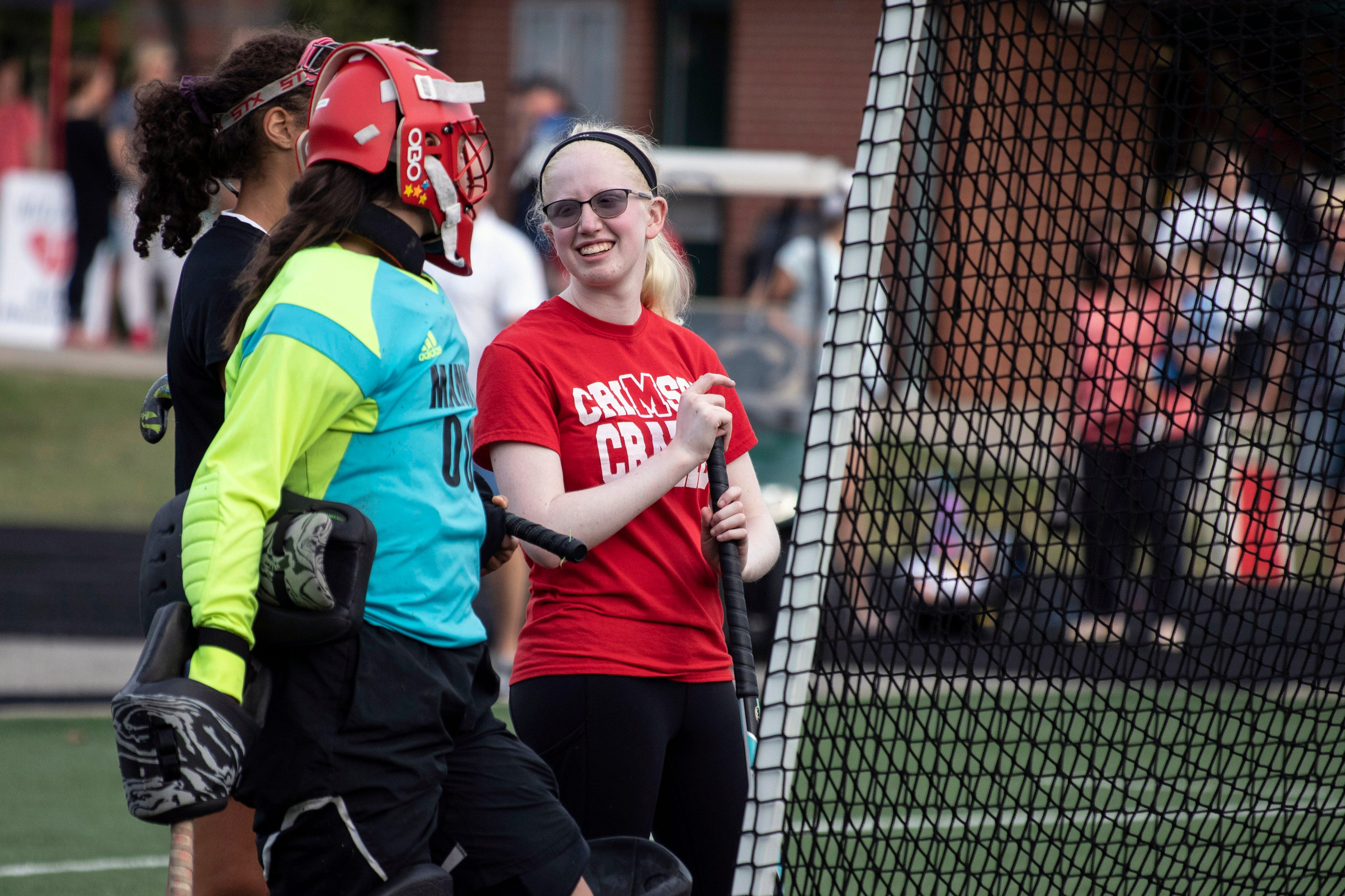 Manual field hockey manager is legally blind and integral to the team
