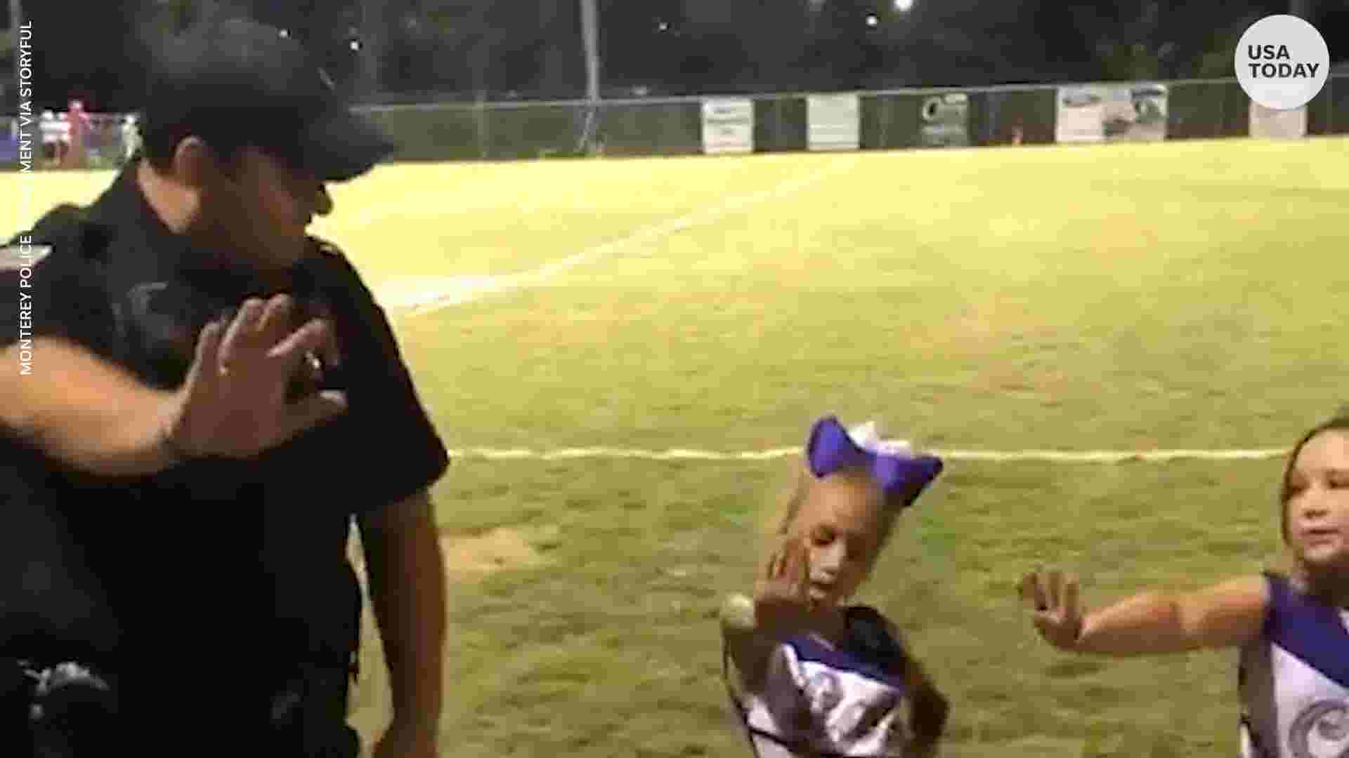 Tiny Cheerleaders Teach Police Officer Cheer Routine During Home Game 