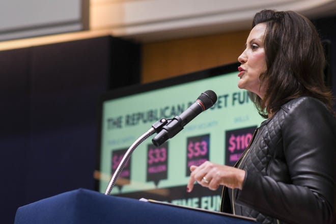 Michigan Gov. Gretchen Whitmer speaks about the state budget Tuesday, Oct. 1, 2019, during a press conference at the State Library and Michigan History Center in Lansing, Michigan.  [AP Photo/Matthew Dae Smith/Lansing State Journal]