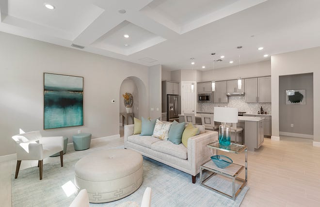 One of 12 home designs offered by Pulte Homes at Greyhawk at Golf Club of the Everglades, the professionally designed Summerwood home shows potential homebuyers the possibilities for a Clive Daniel-decorated home.
