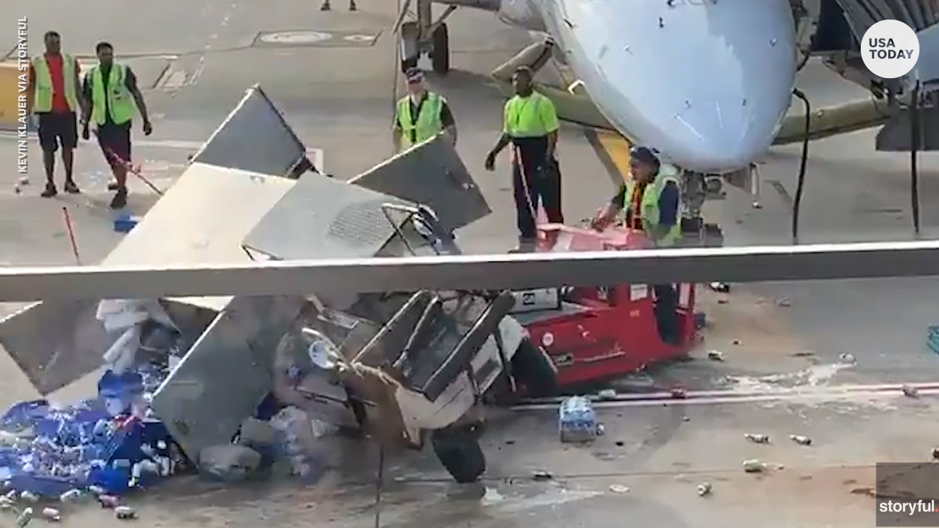 Catering cart spins out of control, almost hits plane at airport