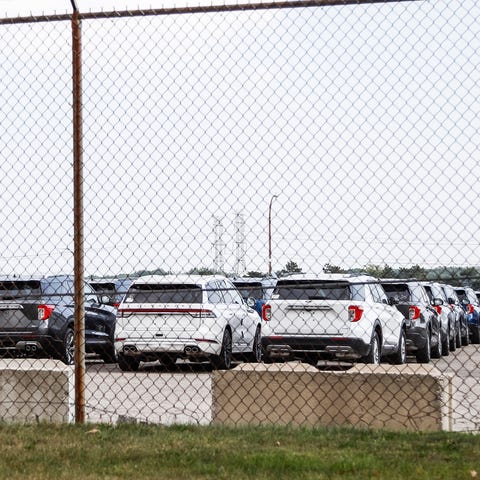 Ford Explorers and Lincoln Aviators parked at the 
