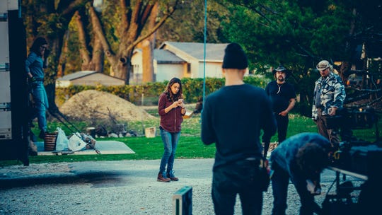 Singer-songwriter and director Haroula Rose works on set during production of her movie "Once Upon a River."