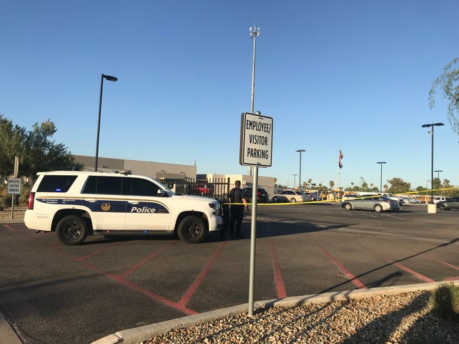 Phoenix police investigate the scene after the death of a child who was left inside a vehicle outside the Washington Elementary School District bus facility in Phoenix on Oct. 1, 2019.