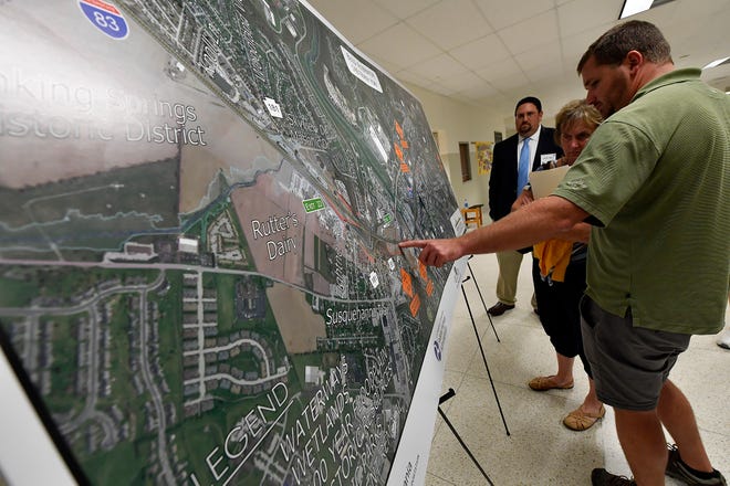 Jason Flohr from Edris Oil Services in North York looks at a map outlining the proposed Interstate 83 widening project to see who it will effect his business during a public meeting detailing the Environmental Assessment of the project, Tuesday, October 1, 2019 at Central York Middle SchoolJohn A. Pavoncello photo