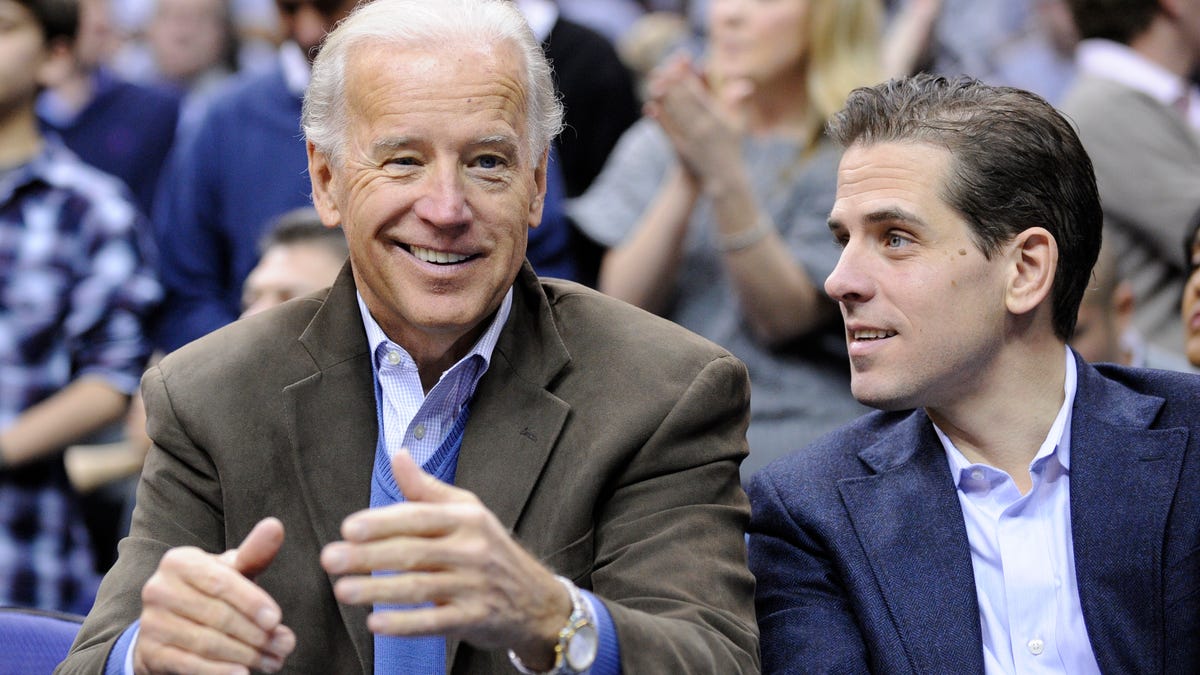 Then-Vice President Joe Biden and son Hunter at a basketball game in Washington in 2010.
