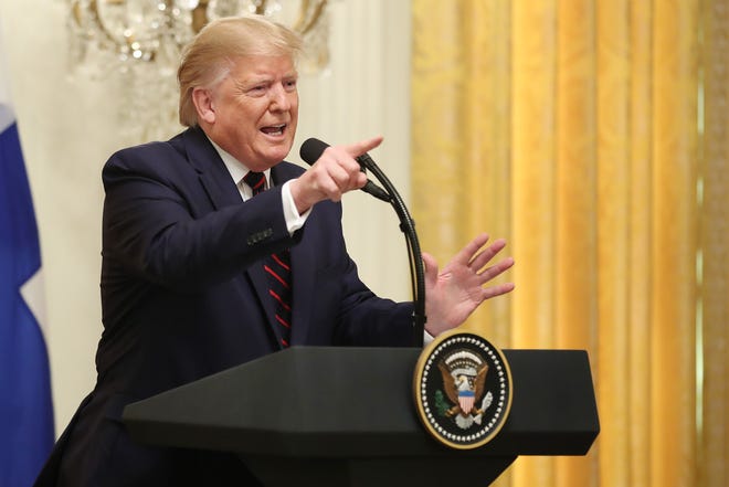 President Donald Trump rails against journalists asking questions about an impeachment inquiry during a joint news conference with Finnish President Sauli Niinisto in the East Room of the White House Oct. 2, 2019 in Washington, DC. 