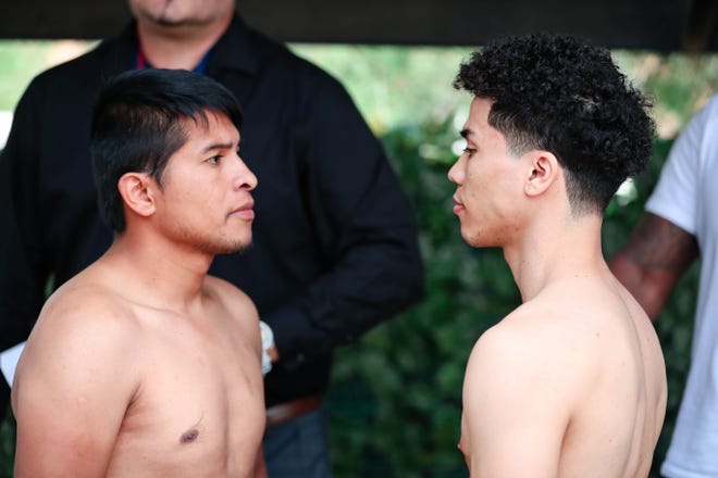 Abel Mendoza and Gustavo Molina weigh in at The Game Sports Bar and Grill in Las Cruces on Friday, Oct. 4, 2019 for the pro boxing card at the Vado Speedway in Vado on Saturday.