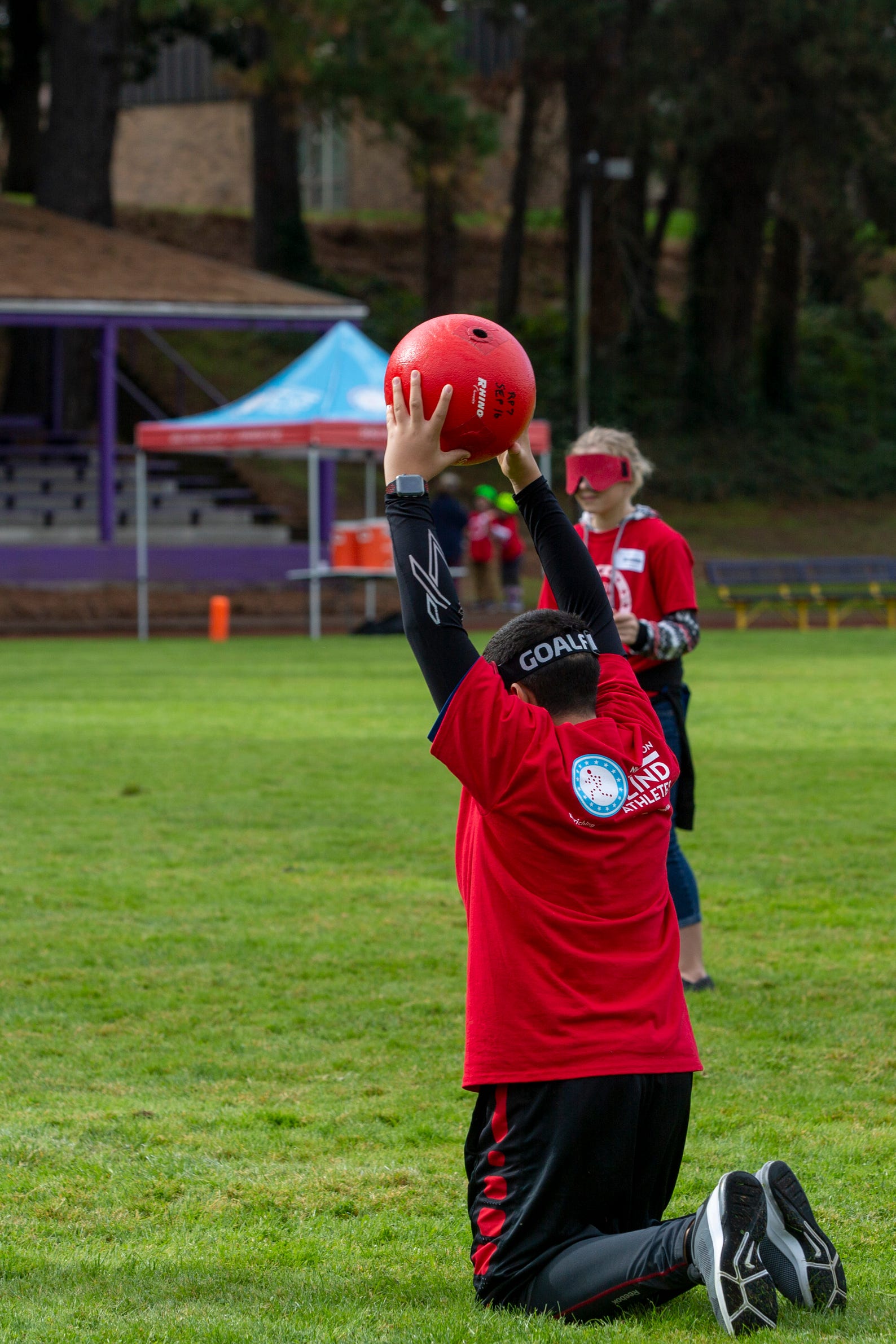 Elwin Rivera, a 7th grader, catches the ball during beep kickball at the Oregon School for the Deaf in Salem, Oct. 4, 2019. NWABA, the Northwest Association for Blind Athletes, hosted a "Paralympic experience" for students with visual impairments in the state. After the Oregon School for the Blind closed in 2009, many visually impaired students and their families lost access to state-funded resources, like sports programs. The BVIS (Blind Visually Impaired Student) Fund gives programs like NWABA funds to enhance the lives of low vision/blind children across the state.