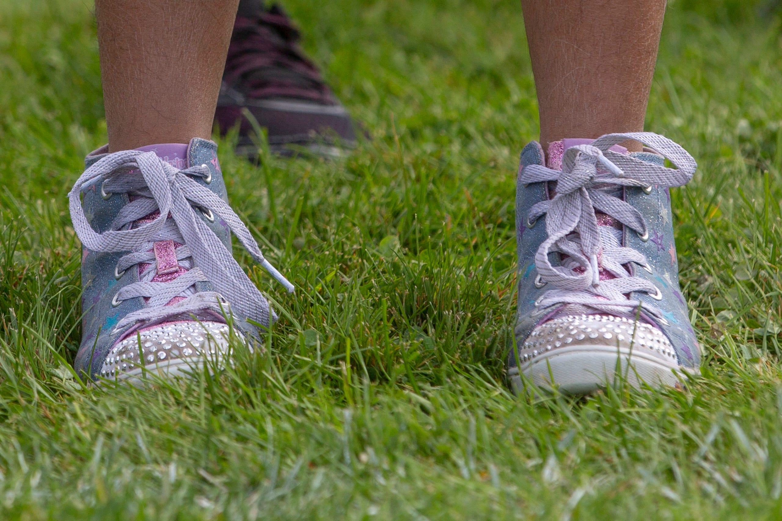 Ruth Gongora, a 6th-grader, wears bedazzled sneakers at the Oregon School for the Deaf in Salem, Oct. 4, 2019. NWABA, the Northwest Association for Blind Athletes, hosted a "Paralympic experience" for students with visual impairments in the state. After the Oregon School for the Blind closed in 2009, many visually impaired students and their families lost access to state-funded resources, like sports programs. The BVIS (Blind Visually Impaired Student) Fund gives programs like NWABA funds to enhance the lives of low vision/blind children across the state.