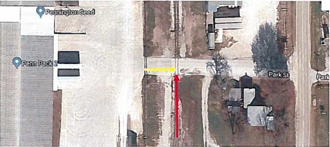This overhead image, included in federal court filings, shows the road and rail crossing where a Kansas man says his truck was hit by uncontrolled rail cars.