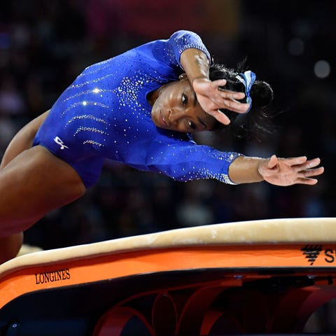 Simone Biles performs on the vault during a traini