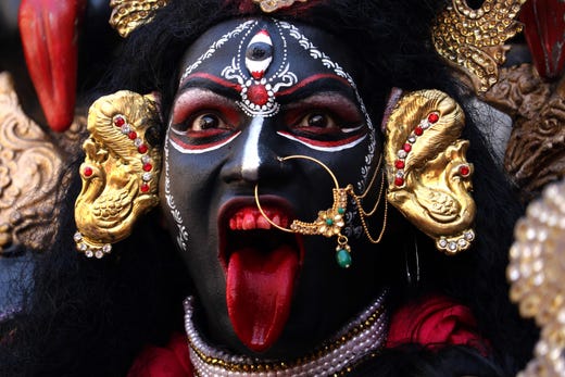 A devotee dressed as the Hindu deity Maha Kali performs during Navratri festival celebrations in Ajmer in Rajasthan state on Oct. 3, 2019.